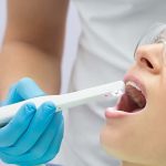 woman receiving dental treatment