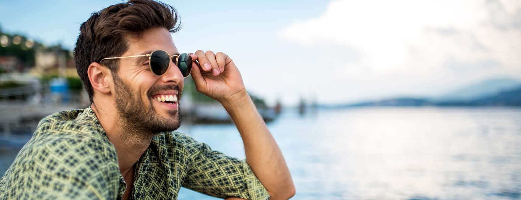 smiling man in sunglasses