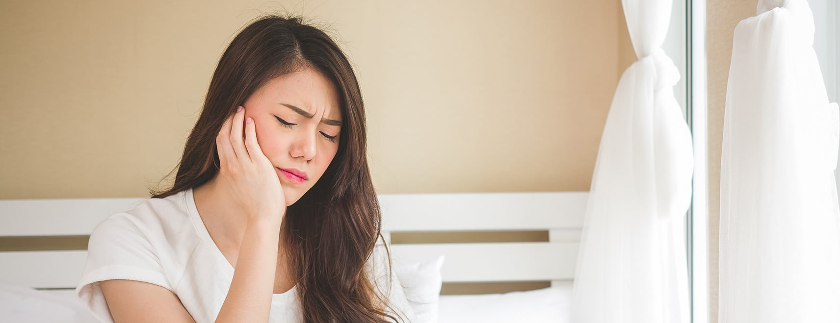woman with mouth pain